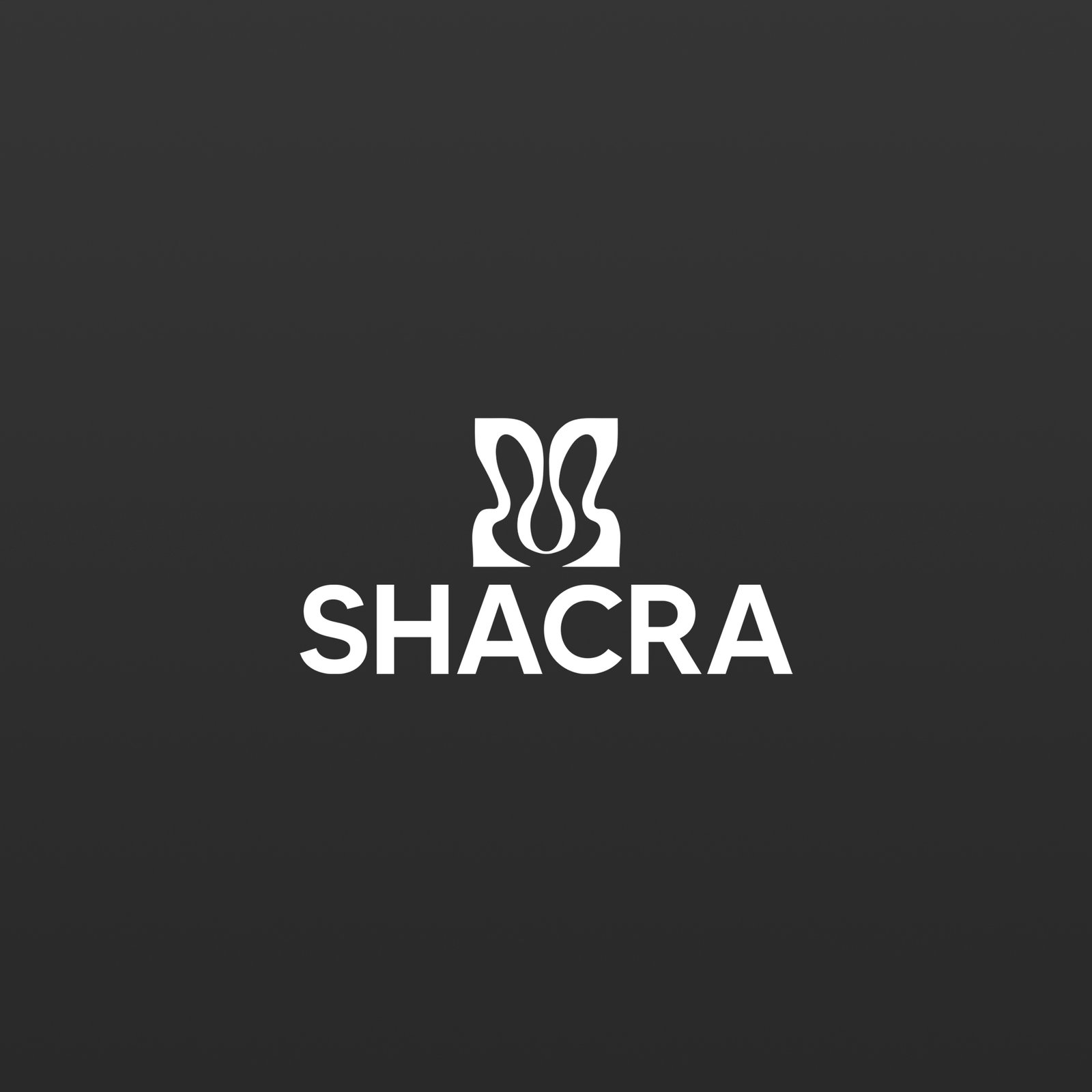 Elegant logo of Shacra with a minimalist design in white on a dark background, featuring a stylized butterfly or floral motif representing natural beauty and creativity.