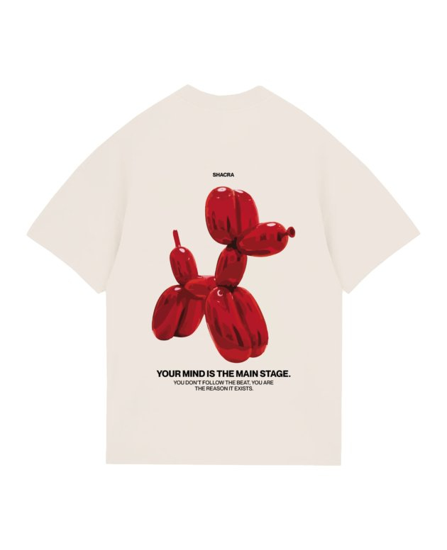 Vibrant red balloon dog graphic on a white t-shirt, featuring bold black text and an inspiring quote about creativity and mindset. Unique streetwear design blending art and fashion by Shacra.