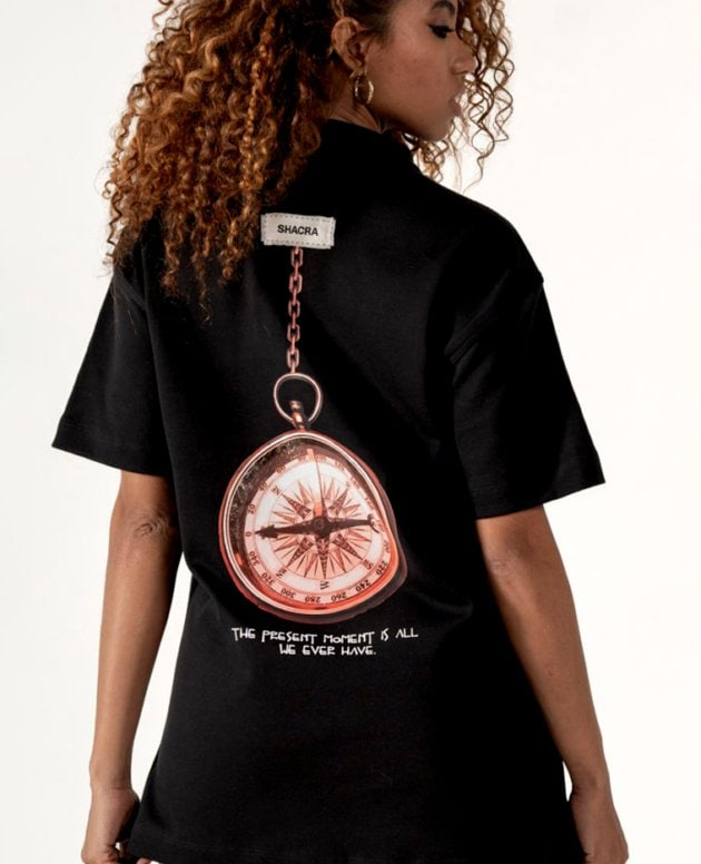 Compass pocket graphic t-shirt with inspirational quote, modern casual fashion, women's streetwear, comfortable oversized shirt, artistic design by Shacra.